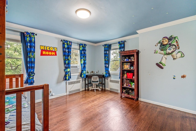 21 Orchard St, Glen Head, NY 11545 - bedroom with radiator heating unit, multiple windows, wood finished floors, and ornamental molding