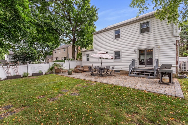 21 Orchard St, Glen Head, NY 11545 - back of house with a patio area