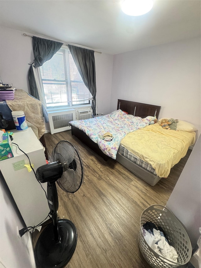 8114 Baxter Ave Unit 1E, Elmhurst, NY 11373 - bedroom with wood finished floors