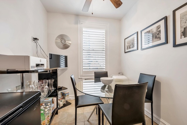 111-15 75th Ave Unit C2, Forest Hills, NY 11375 - tiled dining space with ceiling fan and baseboards