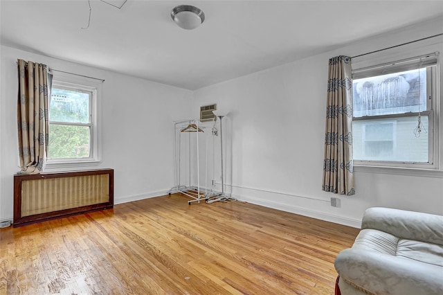 56-28 213th St, Bayside, NY 11364 - unfurnished room featuring radiator and light wood-type flooring
