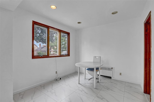 56-28 213th St, Bayside, NY 11364 - dining area with marble finish floors, recessed lighting, and radiator heating unit