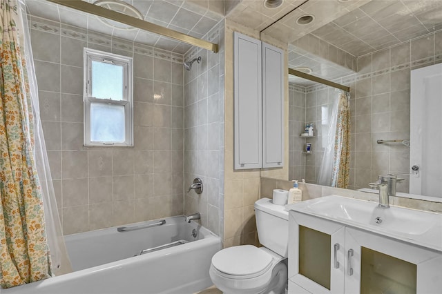 56-28 213th St, Bayside, NY 11364 - bathroom featuring tile walls, shower / bath combination with curtain, and vanity