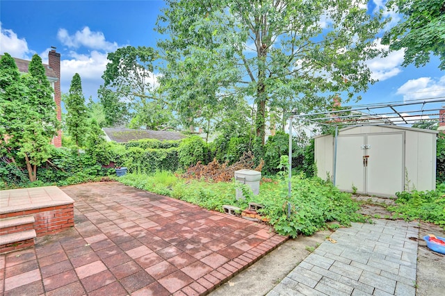 56-28 213th St, Bayside, NY 11364 - view of patio / terrace with a storage shed