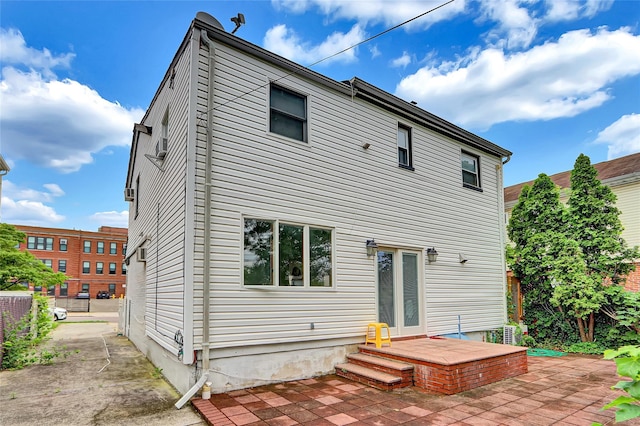 56-28 213th St, Bayside, NY 11364 - back of house featuring a patio