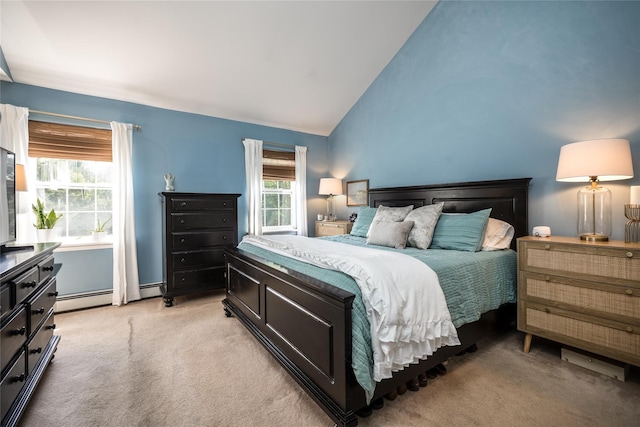 48 Devon Rd, Patterson, NY 12563 - bedroom with vaulted ceiling, light carpet, and a baseboard heating unit