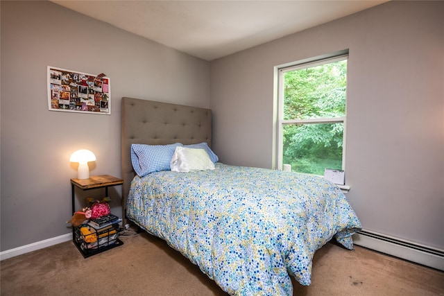 48 Devon Rd, Patterson, NY 12563 - carpeted bedroom with a baseboard heating unit and baseboards