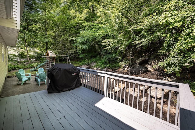48 Devon Rd, Patterson, NY 12563 - wooden deck featuring grilling area and a playground