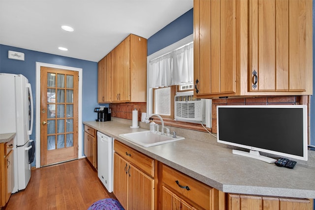 829 Logan Ave, Bronx, NY 10465 - kitchen featuring white appliances, light wood finished floors, light countertops, and recessed lighting