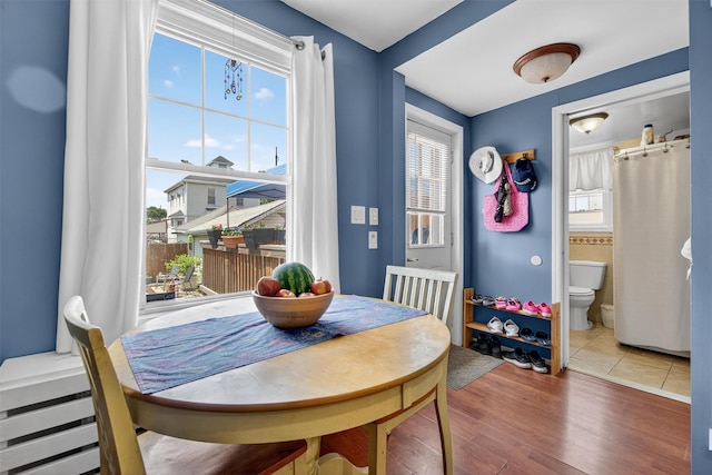 829 Logan Ave, Bronx, NY 10465 - dining room with healthy amount of natural light and wood finished floors