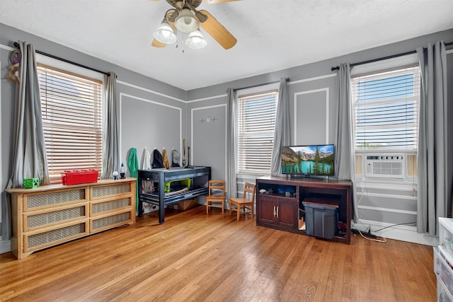 829 Logan Ave, Bronx, NY 10465 - misc room featuring light wood finished floors, a ceiling fan, plenty of natural light, and cooling unit