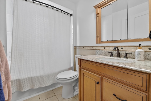 829 Logan Ave, Bronx, NY 10465 - full bathroom featuring vanity, shower / bath combo, tile patterned floors, and wainscoting