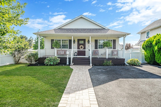 4 Ferndale Blvd, Islip, NY 11751 - view of front of house with covered porch and roof with shingles