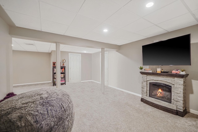 4 Ferndale Blvd, Islip, NY 11751 - finished below grade area featuring carpet flooring, a drop ceiling, a stone fireplace, and recessed lighting