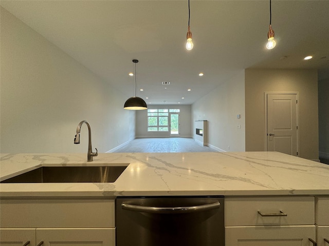 30 Beekman St Unit Ph3, Beacon, NY 12508 - kitchen with dishwasher, open floor plan, light stone counters, recessed lighting, and white cabinets