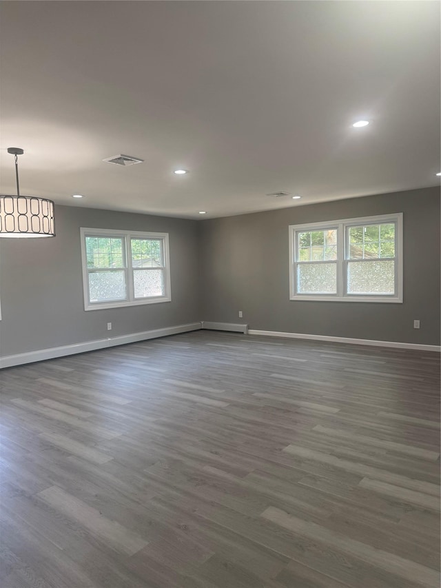 882 Union Blvd, West Islip, NY 11795 - spare room featuring plenty of natural light, dark wood-style floors, and recessed lighting