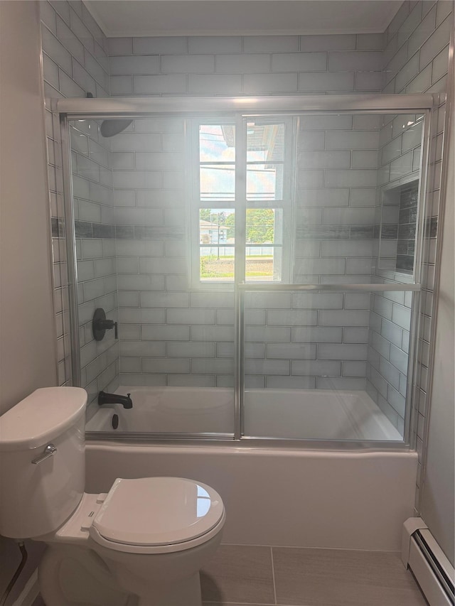 882 Union Blvd, West Islip, NY 11795 - full bathroom featuring a baseboard heating unit, combined bath / shower with glass door, and tile patterned flooring