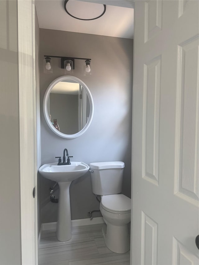 882 Union Blvd, West Islip, NY 11795 - half bath featuring toilet and baseboards