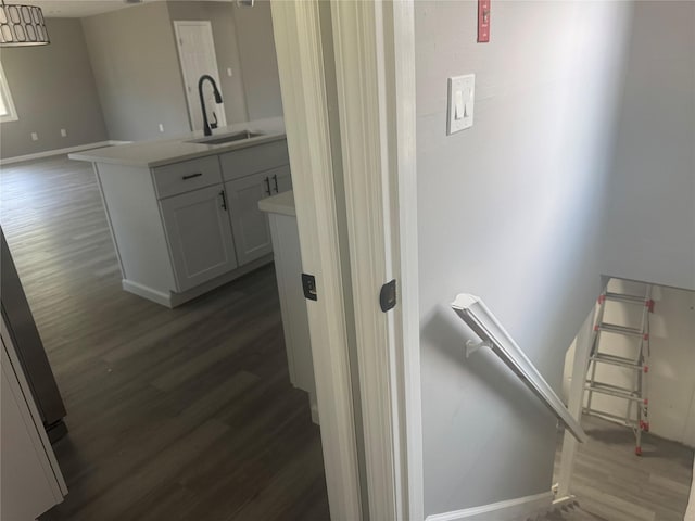 882 Union Blvd, West Islip, NY 11795 - hall featuring wood finished floors and an upstairs landing