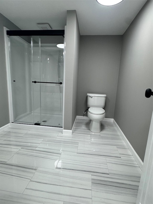 882 Union Blvd, West Islip, NY 11795 - full bathroom featuring toilet and a stall shower