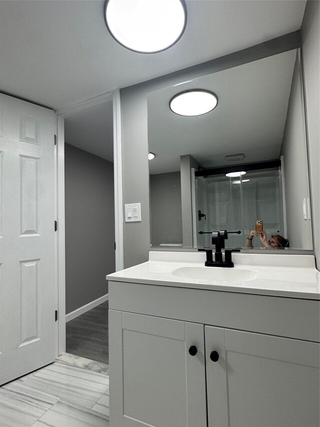 882 Union Blvd, West Islip, NY 11795 - bathroom with vanity and a shower with shower door