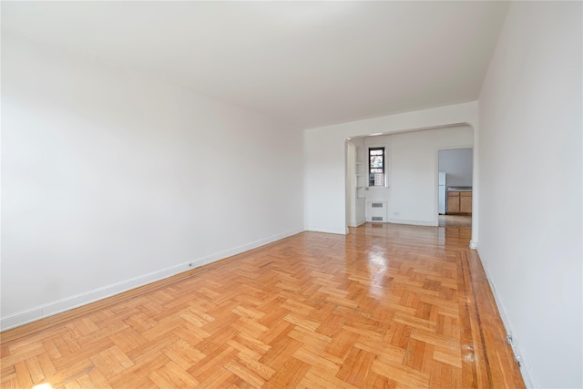 4037 77th St Unit 5B, Elmhurst, NY 11373 - empty room with baseboards