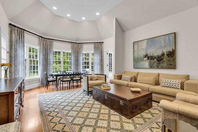 77 Haights Cross Rd, Chappaqua, NY 10514 - living area with light wood-style flooring, high vaulted ceiling, and recessed lighting