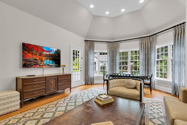 77 Haights Cross Rd, Chappaqua, NY 10514 - living room with high vaulted ceiling, light wood-style floors, and recessed lighting