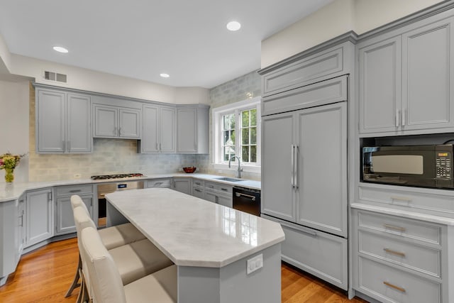 77 Haights Cross Rd, Chappaqua, NY 10514 - kitchen featuring gray cabinetry, paneled fridge, black microwave, dishwashing machine, and recessed lighting