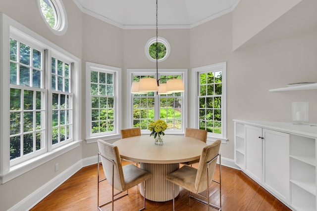 77 Haights Cross Rd, Chappaqua, NY 10514 - dining room with wood finished floors, ornamental molding, and a high ceiling