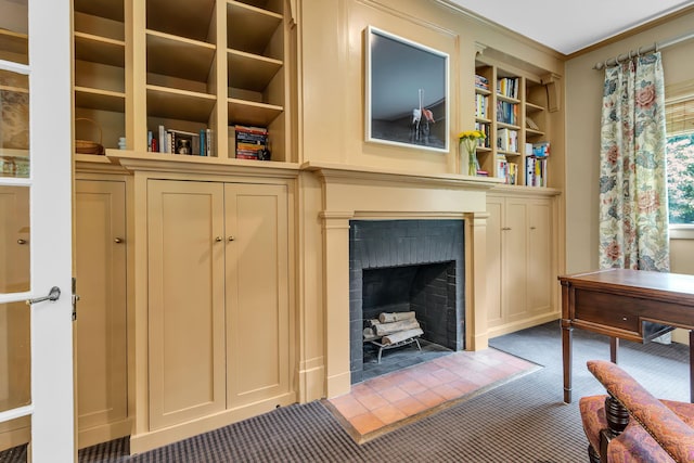 77 Haights Cross Rd, Chappaqua, NY 10514 - living area with built in features, carpet floors, a fireplace with flush hearth, and ornamental molding