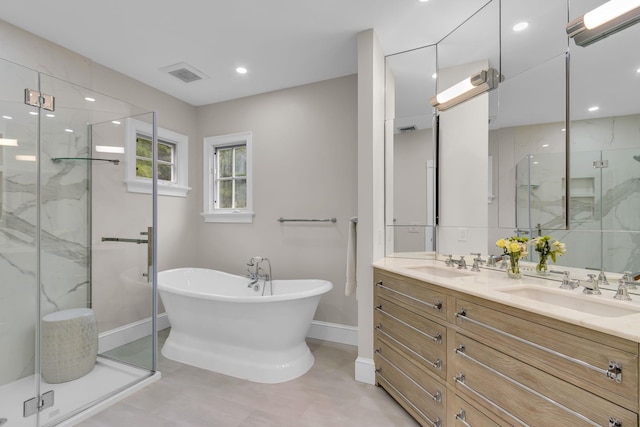 77 Haights Cross Rd, Chappaqua, NY 10514 - bathroom with a marble finish shower, a soaking tub, double vanity, and recessed lighting