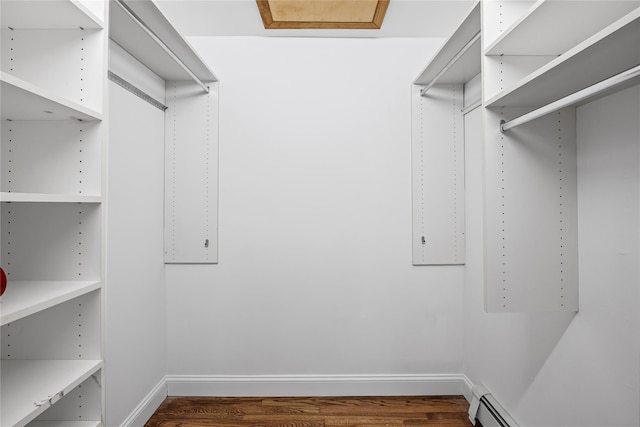 1859 George Ct, Merrick, NY 11566 - spacious closet featuring dark wood finished floors