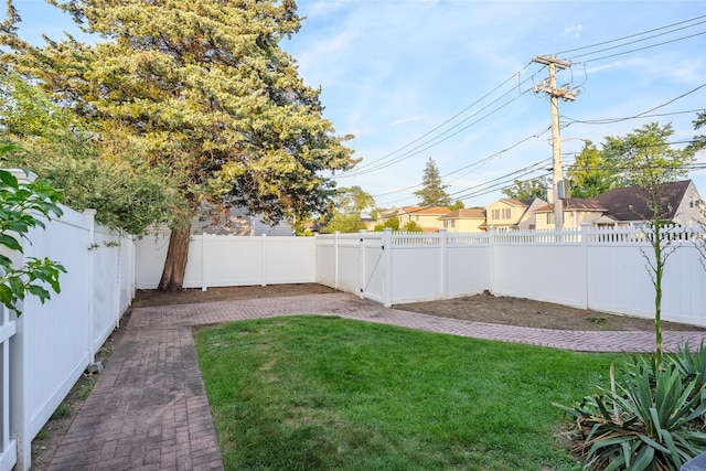 1859 George Ct, Merrick, NY 11566 - fenced backyard featuring a patio