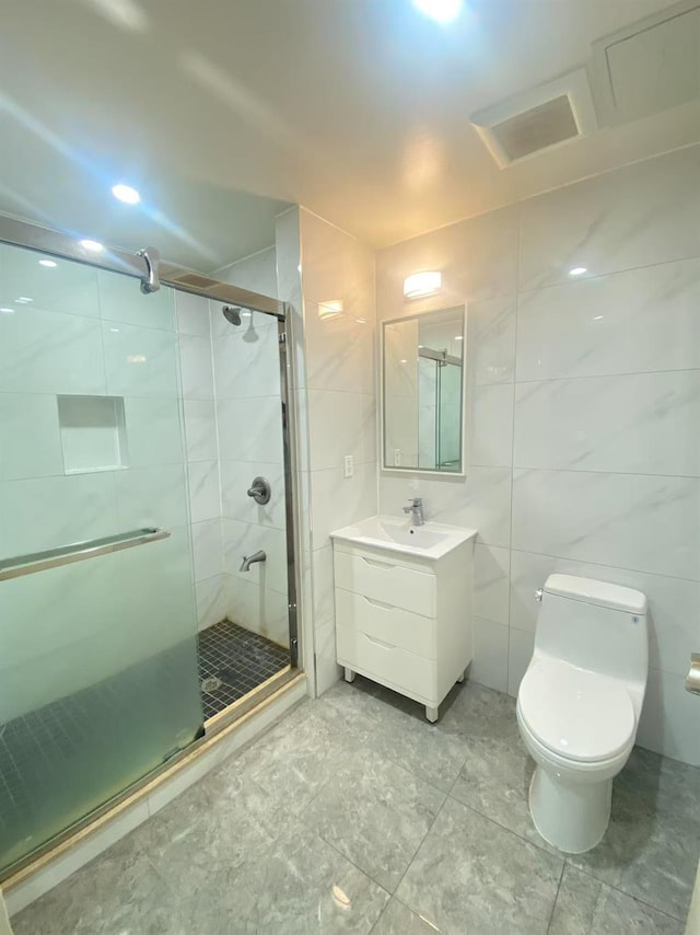 42-22 Crescent St Unit 3B, Long Island City, NY 11101 - full bathroom with tile walls, a shower stall, and vanity