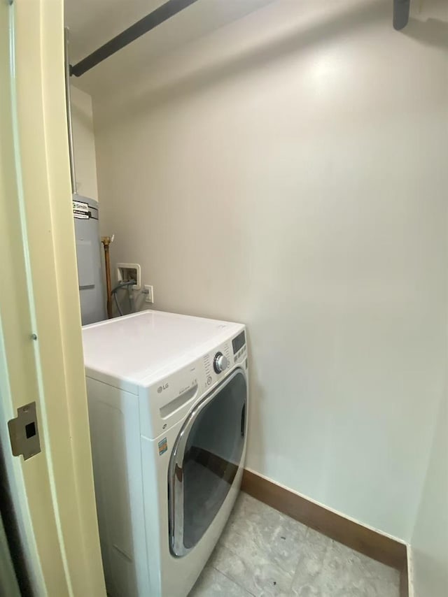 42-22 Crescent St Unit 3B, Long Island City, NY 11101 - laundry room featuring washer / clothes dryer and electric water heater