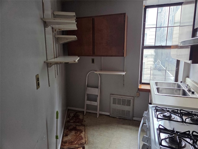 33 Convent Ave Unit 9, New York Manhattan, NY 10027 - kitchen with range with gas cooktop, plenty of natural light, and open shelves