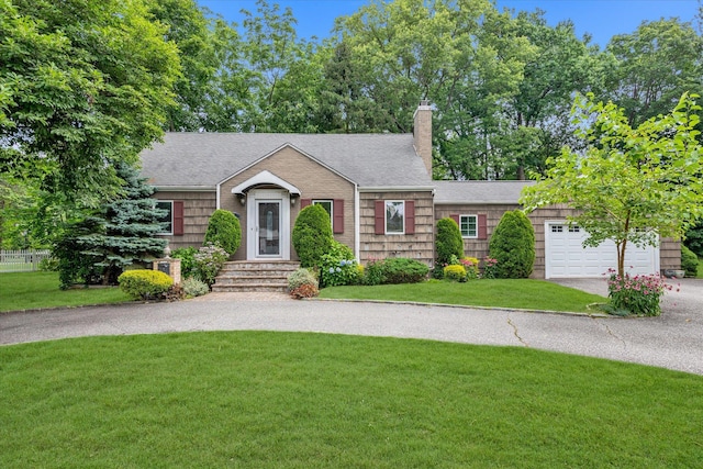 1 Willits Rd, Glen Cove, NY 11542 - view of front facade featuring a front lawn, driveway, a chimney, roof with shingles, and a garage