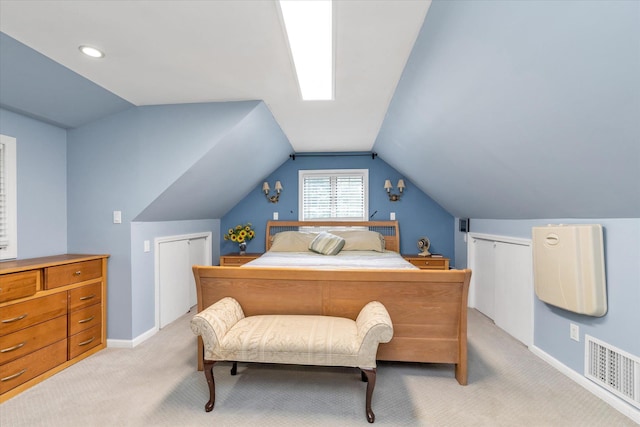 1 Willits Rd, Glen Cove, NY 11542 - bedroom with vaulted ceiling and light carpet