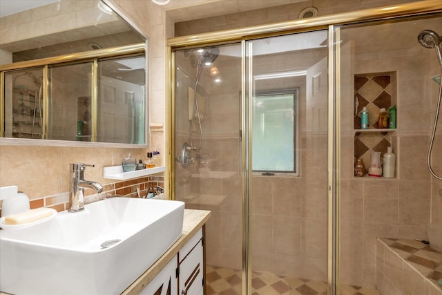 1 Willits Rd, Glen Cove, NY 11542 - full bath with vanity, a shower stall, backsplash, and tile walls
