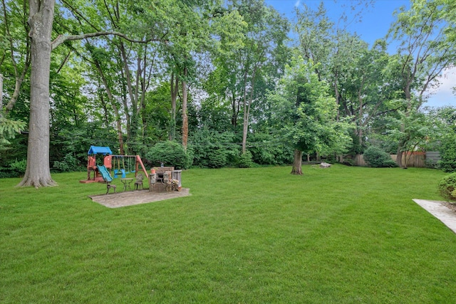 1 Willits Rd, Glen Cove, NY 11542 - view of green lawn featuring a playground