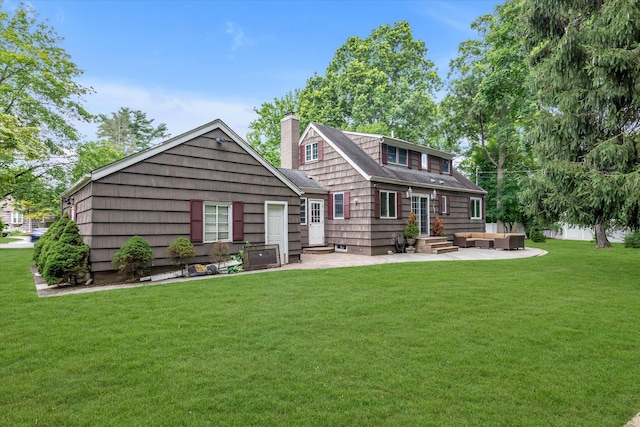 1 Willits Rd, Glen Cove, NY 11542 - back of house featuring an outdoor hangout area, entry steps, a chimney, a lawn, and a patio