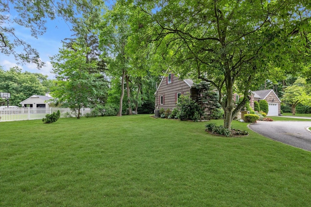 1 Willits Rd, Glen Cove, NY 11542 - view of yard featuring a garage and driveway