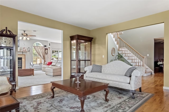 9 Clark Rd, Goshen, NY 10924 - living area with wood finished floors, stairway, and ceiling fan