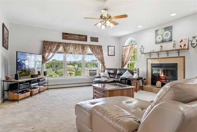 9 Clark Rd, Goshen, NY 10924 - living room featuring a baseboard heating unit, light carpet, ceiling fan, a tiled fireplace, and recessed lighting