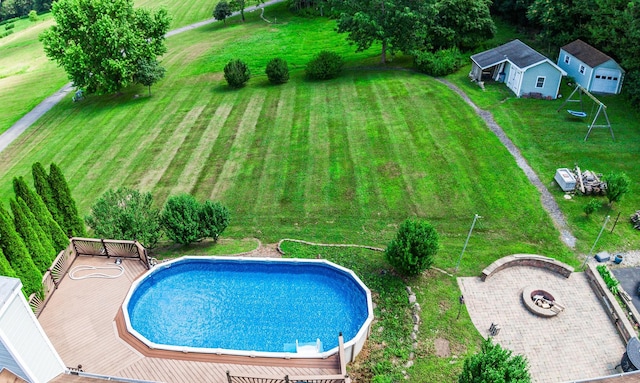 9 Clark Rd, Goshen, NY 10924 - swimming pool with a deck, a lawn, and an outbuilding
