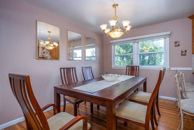 7 Gilmore Dr, Stony Point, NY 10980 - dining room featuring a chandelier and wood finished floors