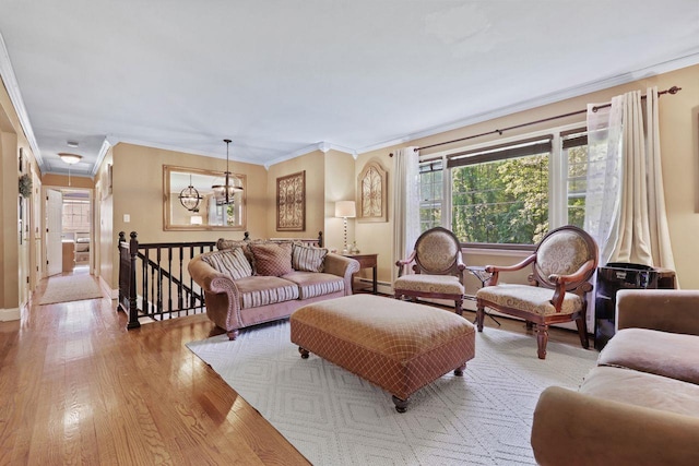 39 Bykenhulle Rd, Hopewell Junction, NY 12533 - living area featuring baseboard heating, light wood-style flooring, attic access, and ornamental molding