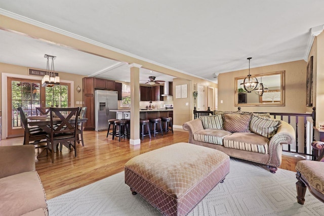 39 Bykenhulle Rd, Hopewell Junction, NY 12533 - living room with light wood-type flooring, ornamental molding, a chandelier, and ceiling fan