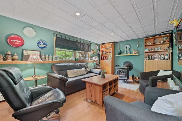39 Bykenhulle Rd, Hopewell Junction, NY 12533 - living area featuring wood finished floors, a wood stove, and recessed lighting